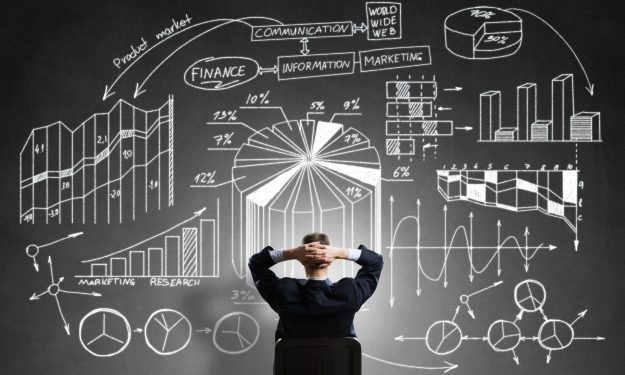 Businessman drawing business strategy